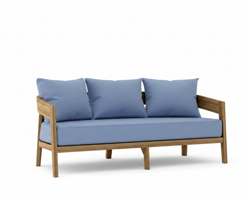 Toscana teak sofa with ocean blue cushions on a white background.