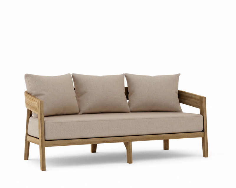 Toscana teak sofa with cast silver cushions on a white background.