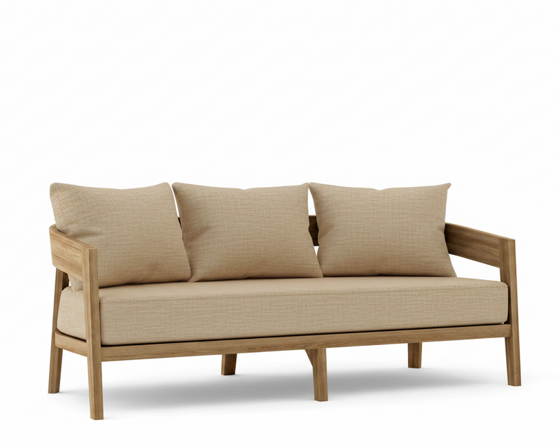 Toscana teak sofa with dupione sand cushions on a white background.
