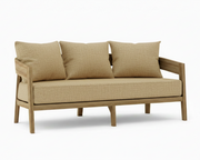 Toscana teak sofa with linen sesame cushions on a white background.