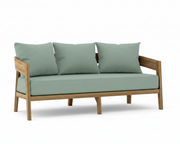 Toscana teak sofa with spa colored cushions on a white background.