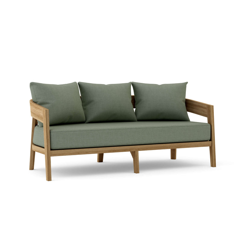 Toscana teak sofa with cast sage cushions on a white background.