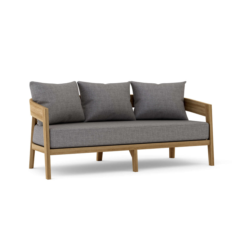 Toscana teak sofa with  cast slate cushions on a white background.