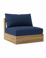 A modern outdoor lounge chair with a thick navy blue cushioned seat and backrest, supported by a light brown wood frame, shown on a solid white background.