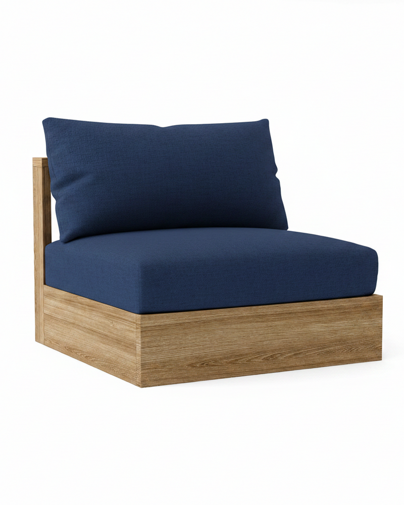 A modern outdoor lounge chair with a thick navy blue cushioned seat and backrest, supported by a light brown wood frame, shown on a solid white background.