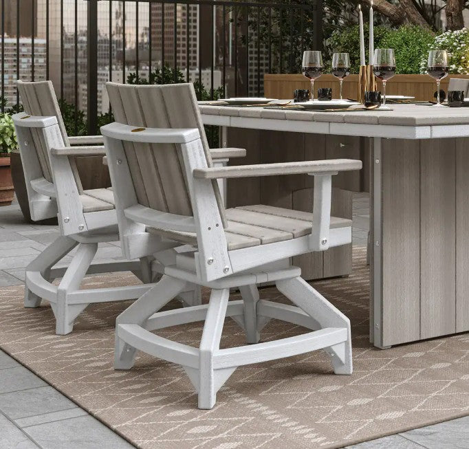 Three Adirondack-style outdoor dining chairs in a light gray and beige finish arranged around a matching dining table on a patio.