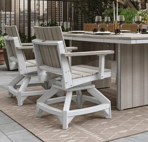Three Adirondack-style outdoor dining chairs in a light gray and beige finish arranged around a matching dining table on a patio.