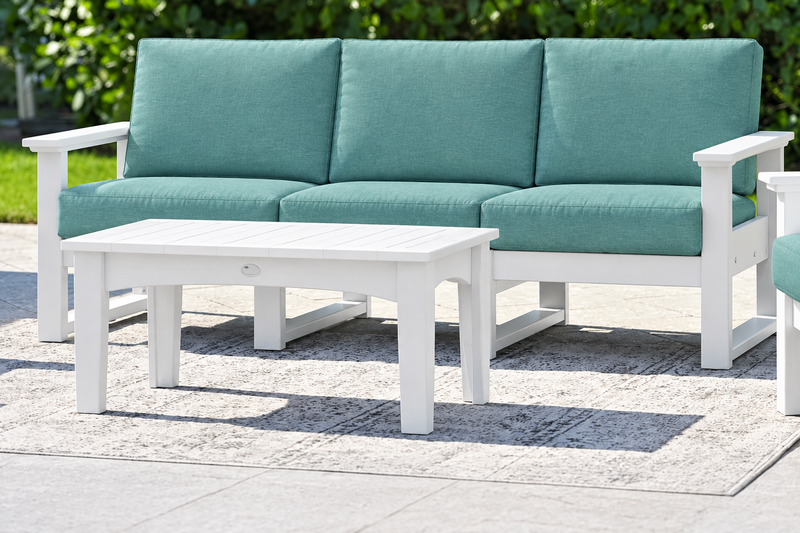 White-frame sofa with Cast Breeze cushions
