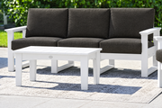 White-frame sofa with Spectrum Carbon cushions