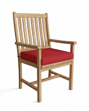 Wooden chair with a red cushion on a white background