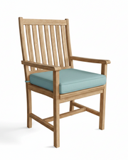 Wooden chair with a light blue cushion on a white background