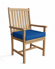 Wooden chair with a blue cushion on a white background