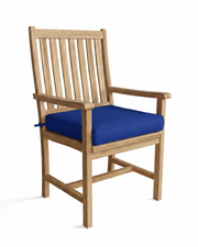 Wooden chair with a blue cushion on a white background